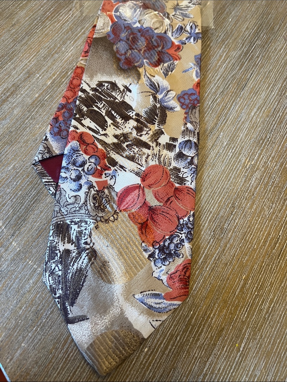 Men's Floral Tie in Beige with Red & Blue Accents.